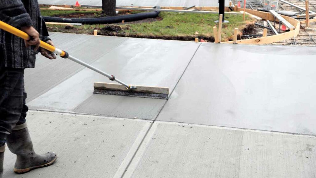 Image of Frisco, TX concrete contractors installing a concrete driveway.